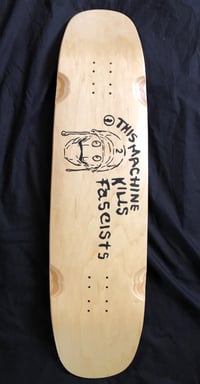 Image 1 of This Machine Kills Fascists Skateboard