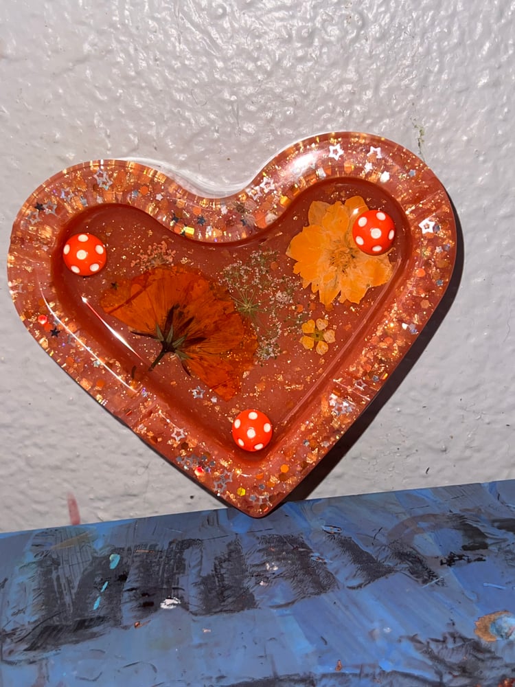 Image of Orange flower and mushroom ashtray. Heart shape 