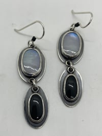 Image 1 of Moonstone and onyx earrings.