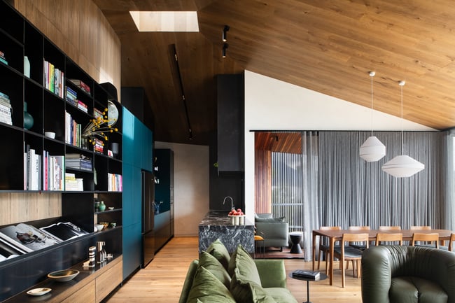 ROSE DINING CHAIR IN AMERICAN WALNUT WITH AN UPHOLSTERED LEATHER SEAT