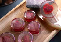 Image 1 of Double Flare Plugs - Round - 12mm - 50mm - Translucent Heart - Custom Plugs for Stretched Ears 