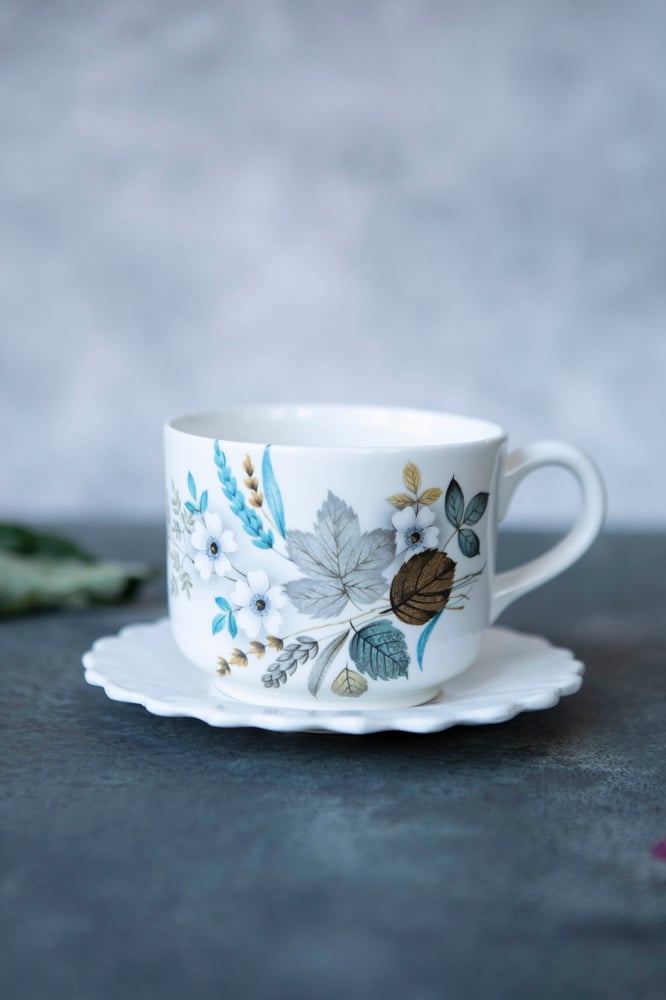 Image of Kopp med blå blomst 
