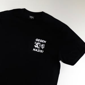 Image of Black Edition: UP X Random Above Reason "WE LOVE TAGS AND HATE NAZIS" Shirt