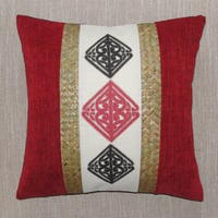 Image 1 of Pā o te hā  cushion in red