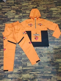 Orange Loyalty Over Love  Windbreaker