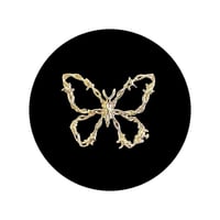 Image 2 of Barbwire Butterfly Tooth Charm