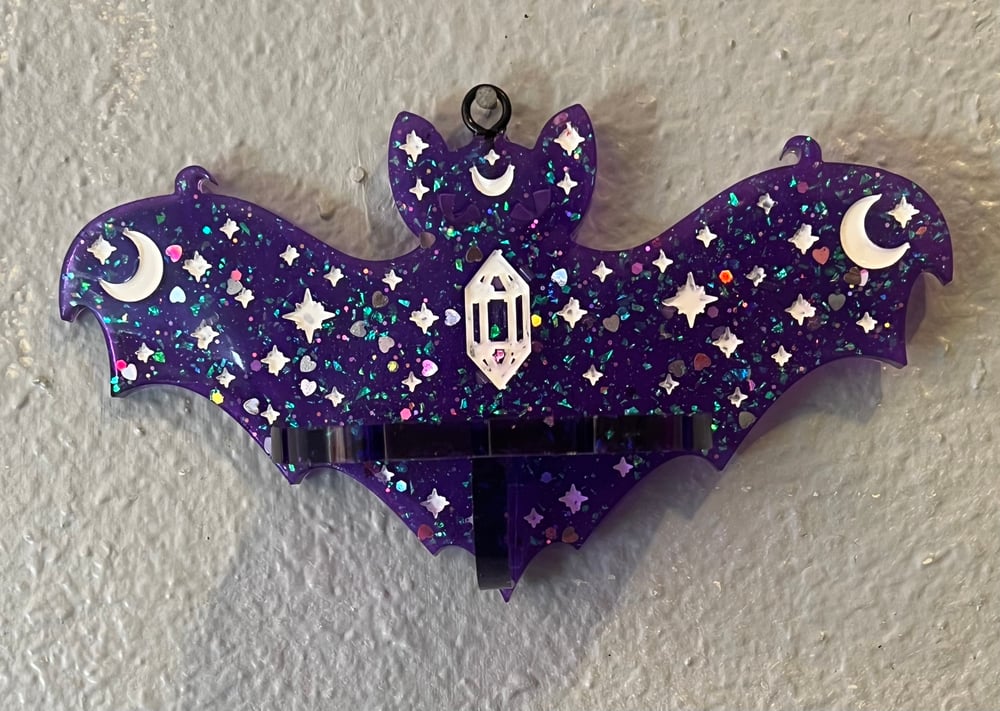 Image of Purple bat hanging shelf