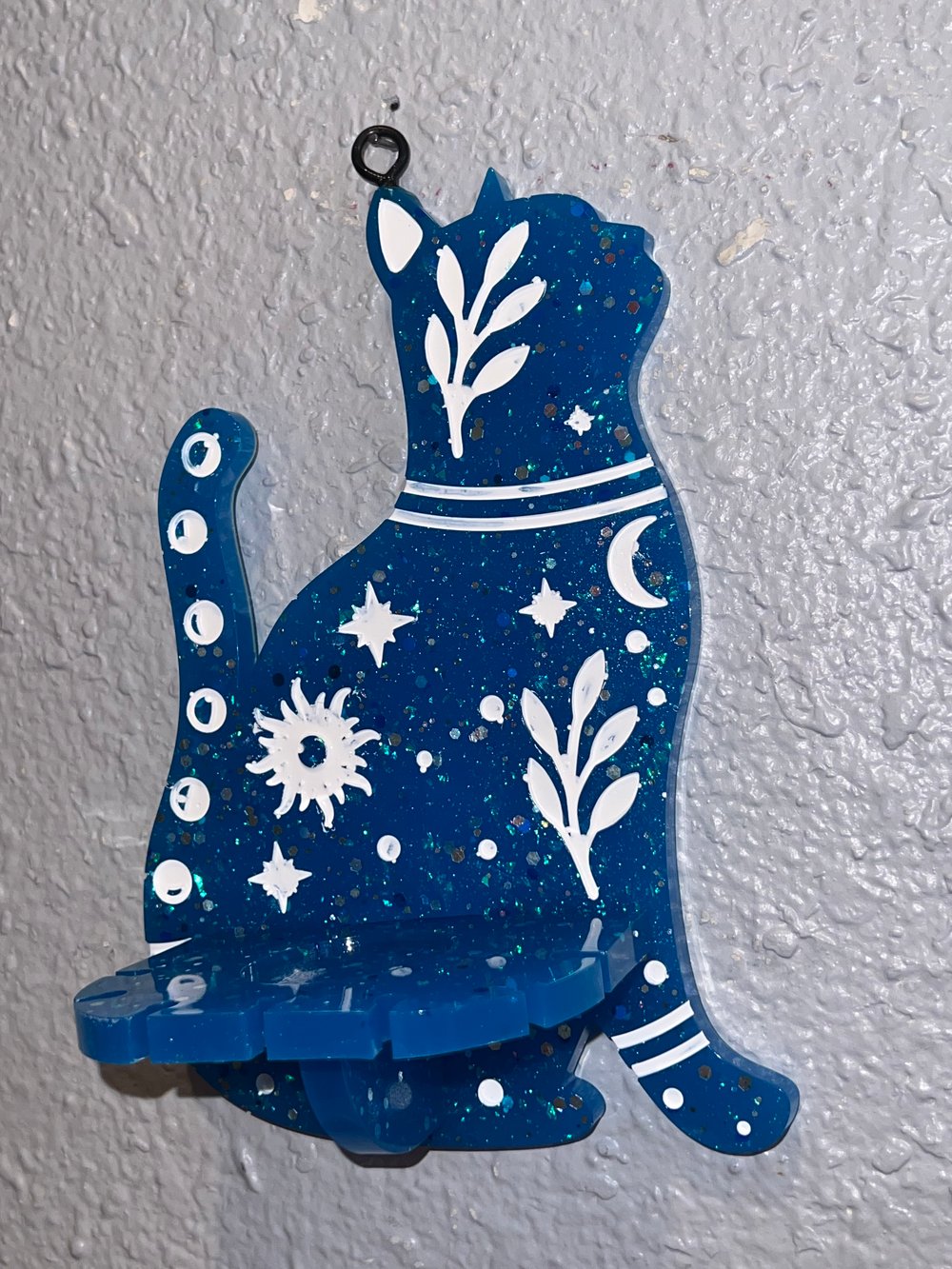 Image of Blue cat hanging shelf