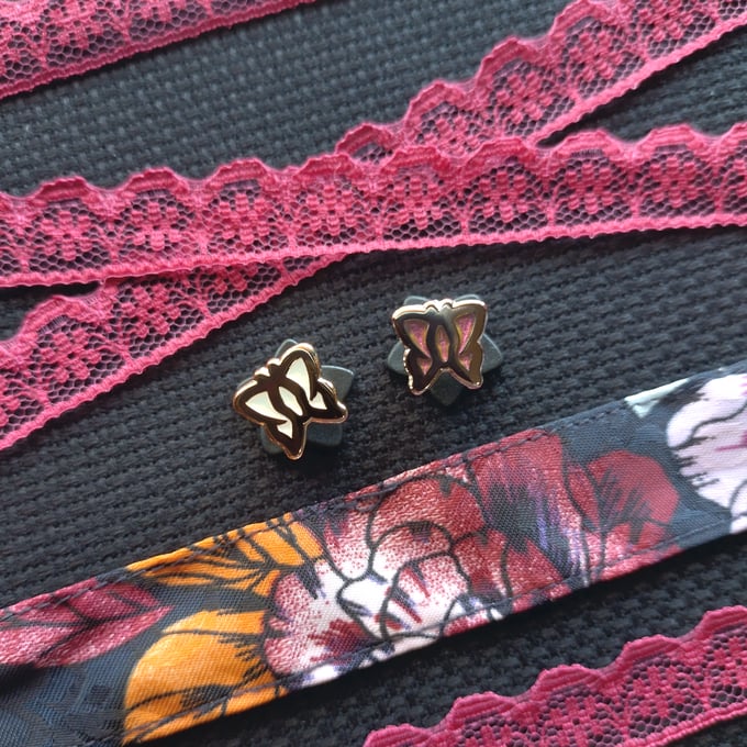 Image of Polarising Variant Mini Butterfly Enamel Pins