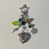 she was a green fairy locket star keychain