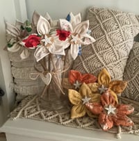 Image 1 of Custom created Memory Flowers created from a clients loved ones collection of beautiful doilies