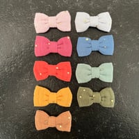 Barrette en gaze de coton à pois dorés 