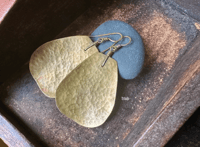 Image 1 of Something in brass earrings. n36