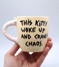 Image 2 of This kitty woke up and craves chaos (and a cig)