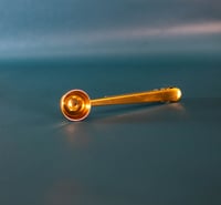 Gold spoon with clip
