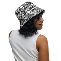 Image 4 of "Reversible Australian flowers and skull" bucket hat