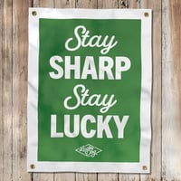 Stay Sharp Stay Lucky Camp Flag