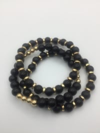 Image 4 of Black & Gold bracelets