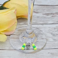 Image 1 of Yellow Green Sun and Moon Wine Glass Charms