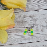 Image 3 of Yellow Green Sun and Moon Wine Glass Charms