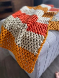 Crochet baby blanket- Warm tones