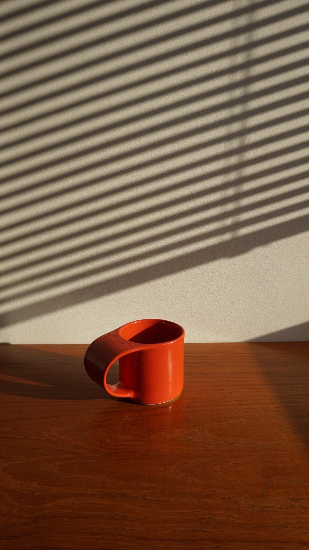 Image of "The signature cup", red-orange