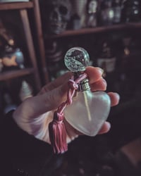 Crystal ball perfume bottle