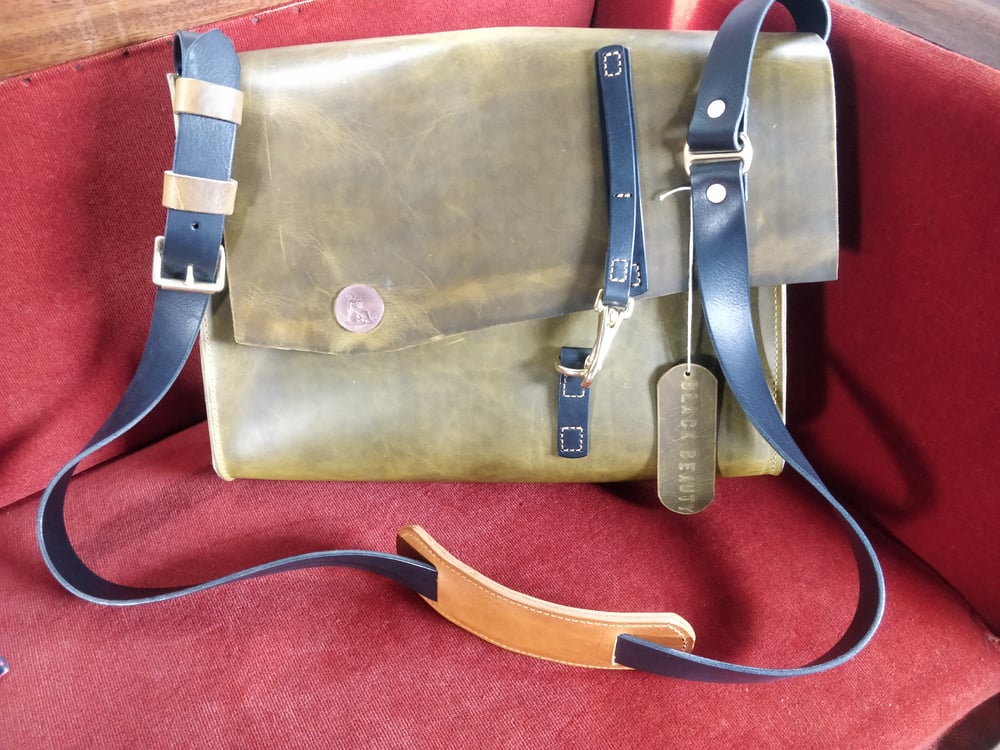 Black Beauty 1877 messenger bag.