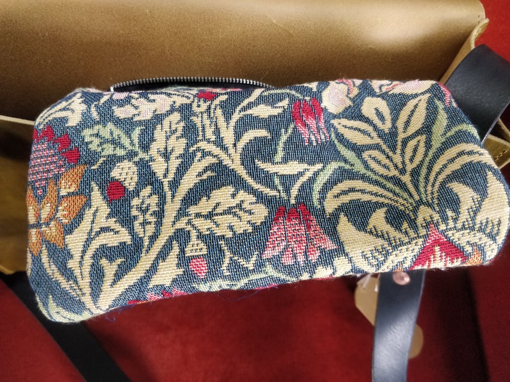 Black Beauty 1877 messenger bag.