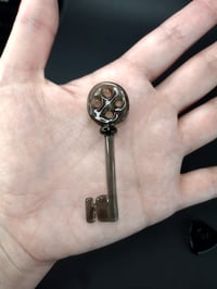 Image 2 of Coraline glass charms