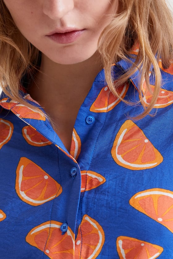 Image of Camisa naranjas.