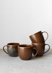 Image 1 of SAMPLE: Curved mug in Russet