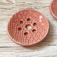 Image 4 of Handmade Ceramic Curved Flower Frog – Translucent Pink