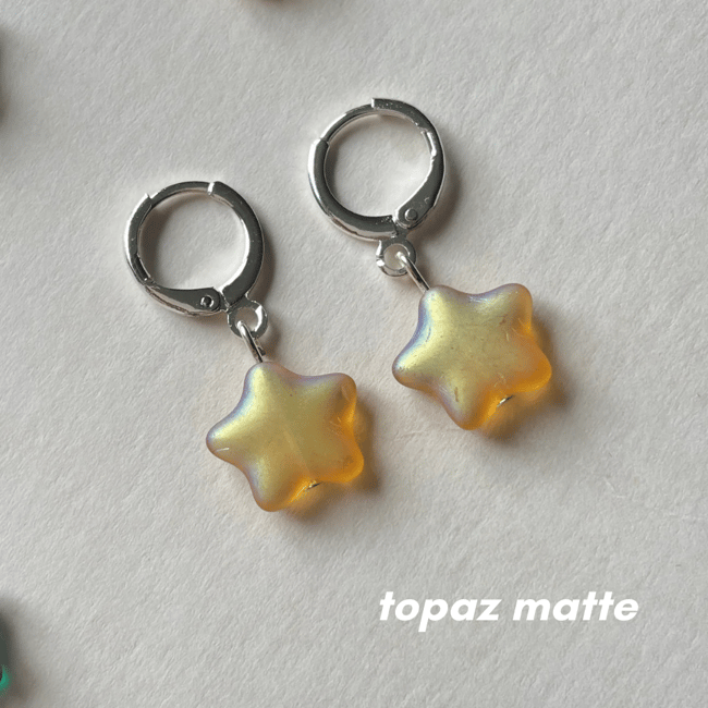 big star huggie hoop earrings