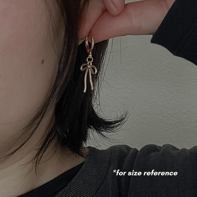 two tone gold droopy bows huggie hoop earrings