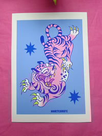 Image 2 of crazy tigers