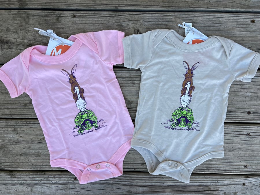 Image of Tur-Duck-It Baby Onesies in Pink and Natural