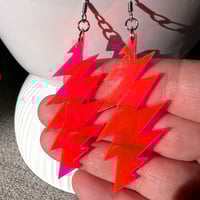 Image 4 of Neon Pink Transparent Grateful Dead 13-Point Bolt Earrings