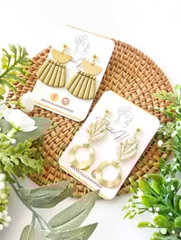 Image 2 of White and Antique Gold Earrings