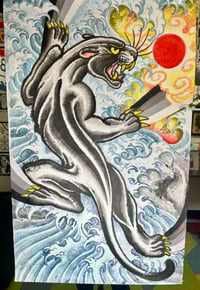 Panther Surfing in Light 