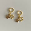 gold star gold huggie hoop earrings