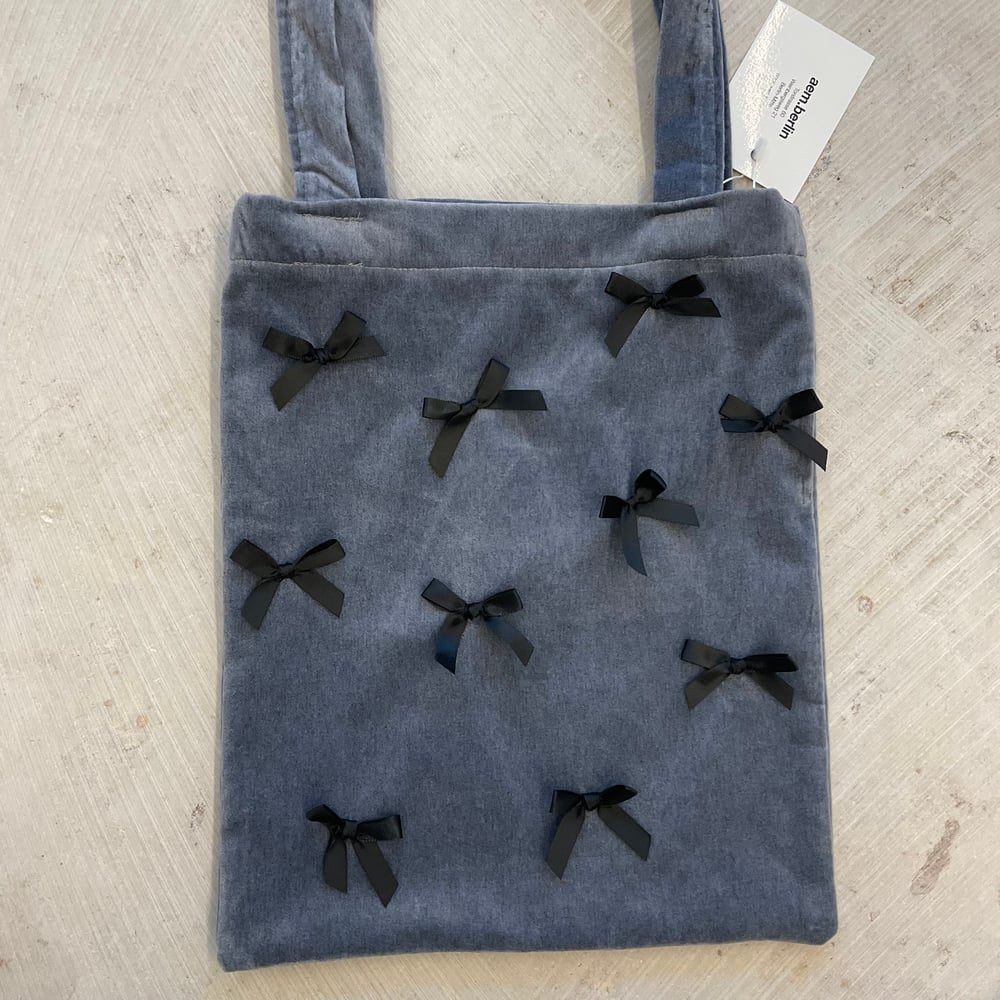 Velvet bag with black bows