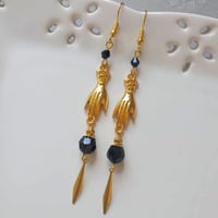 Image 1 of Victorian golden hand charm long earrings handmade with black faceted glass beads & brass drops