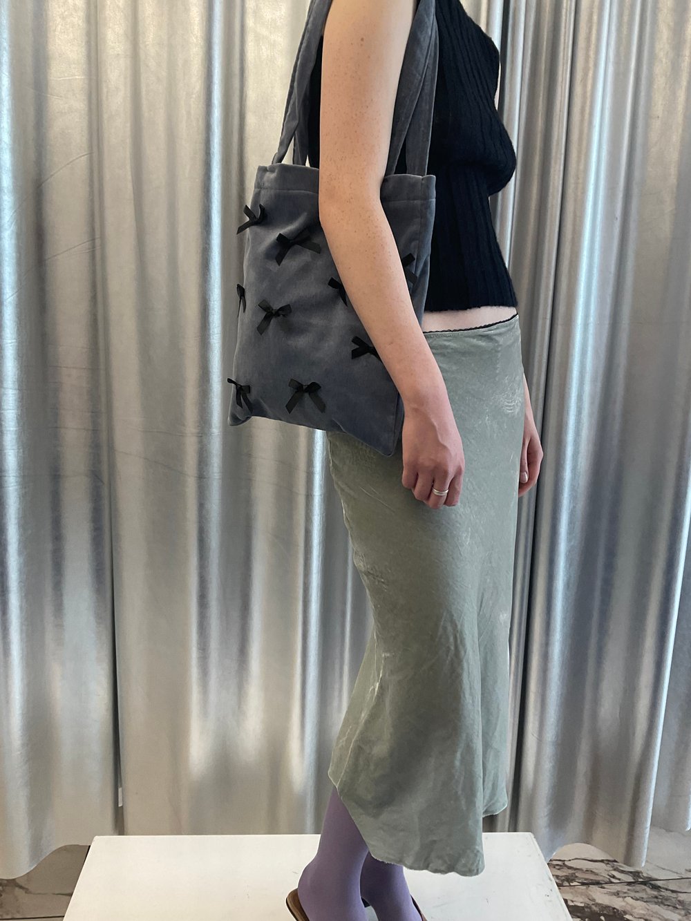 Velvet bag with black bows