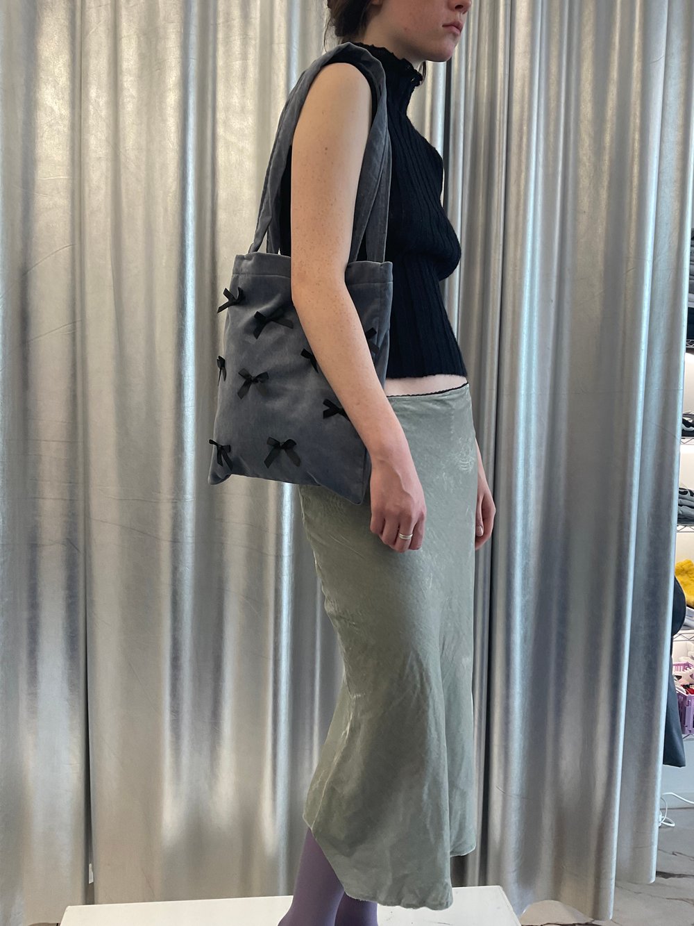 Velvet bag with black bows