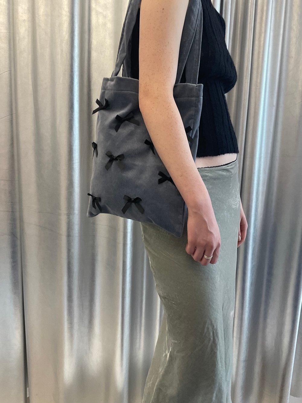 Velvet bag with black bows