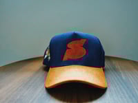 Image 1 of Navy blue corduroy with a tan brim 