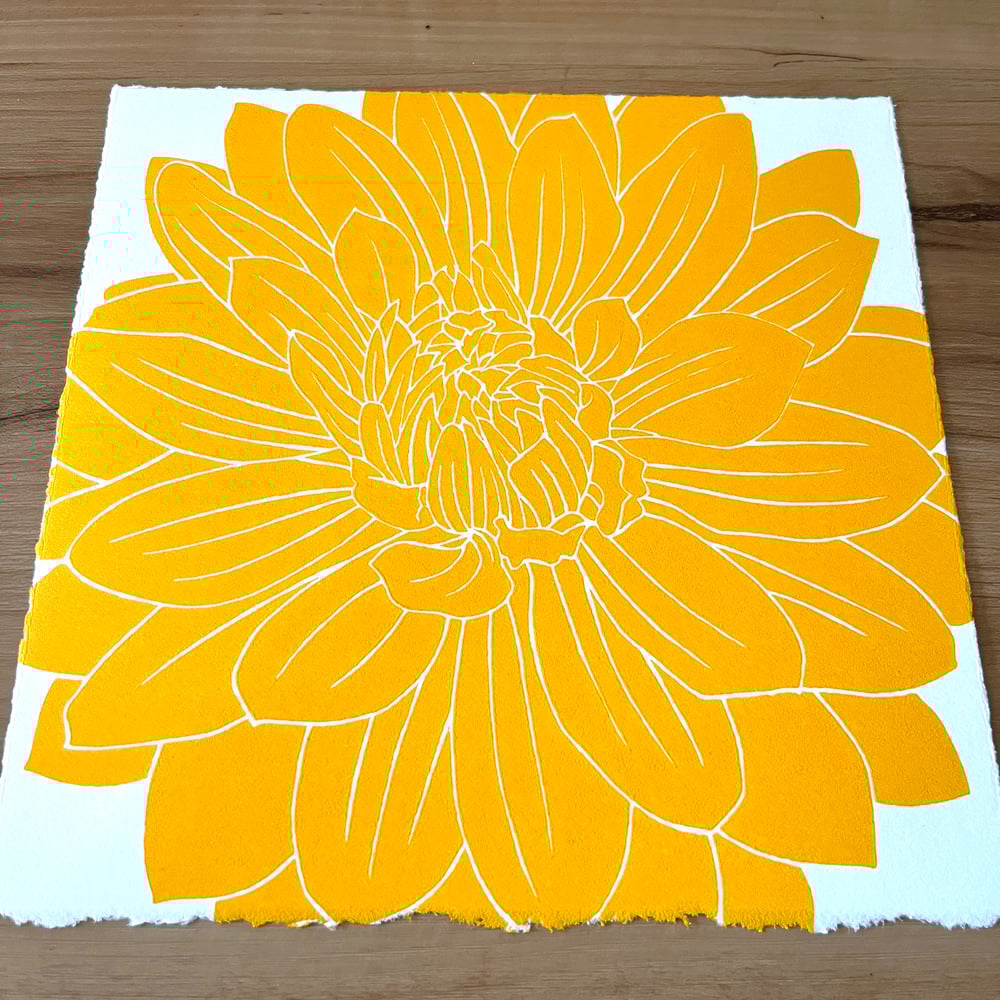 Image of Dahlia (in golden yellow on white paper)