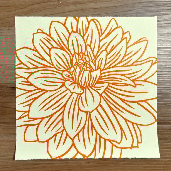 Image of Dahlia (in orange on yellow paper)
