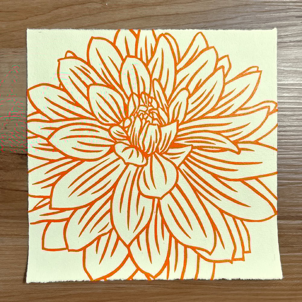 Image of Dahlia (in orange on yellow paper)